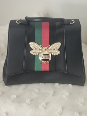 Queen Bee Stripe 2-in-1 satchel made of faux vegan leather